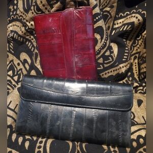 NWOT Red or Black wallets with lots of room for cards and zippered pockets